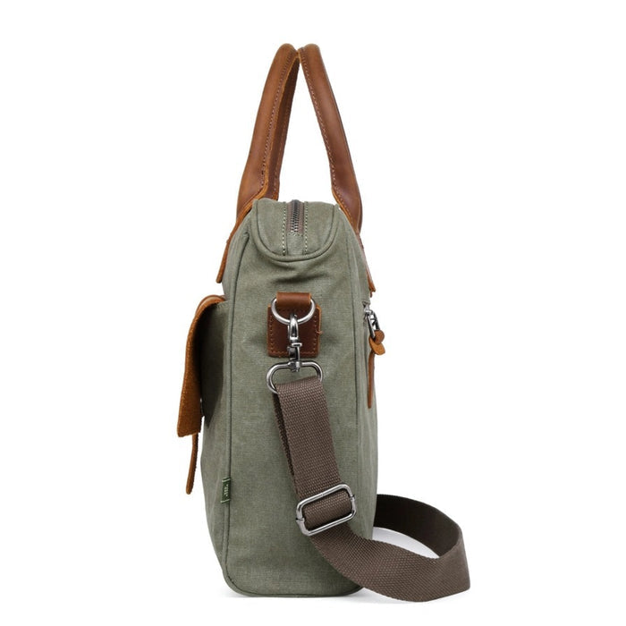Top view of an open TSD BRAND - VALLEY HILL BRIEFCASE tote with brown leather handles, spacious interior, zip pocket, divider, and pink lining—a chic, sustainable TSD BRAND work bag for daily use.
