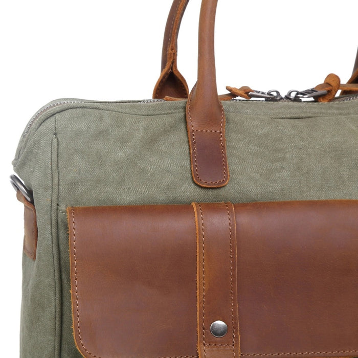 Top view of an open TSD BRAND - VALLEY HILL BRIEFCASE tote with brown leather handles, spacious interior, zip pocket, divider, and pink lining—a chic, sustainable TSD BRAND work bag for daily use.