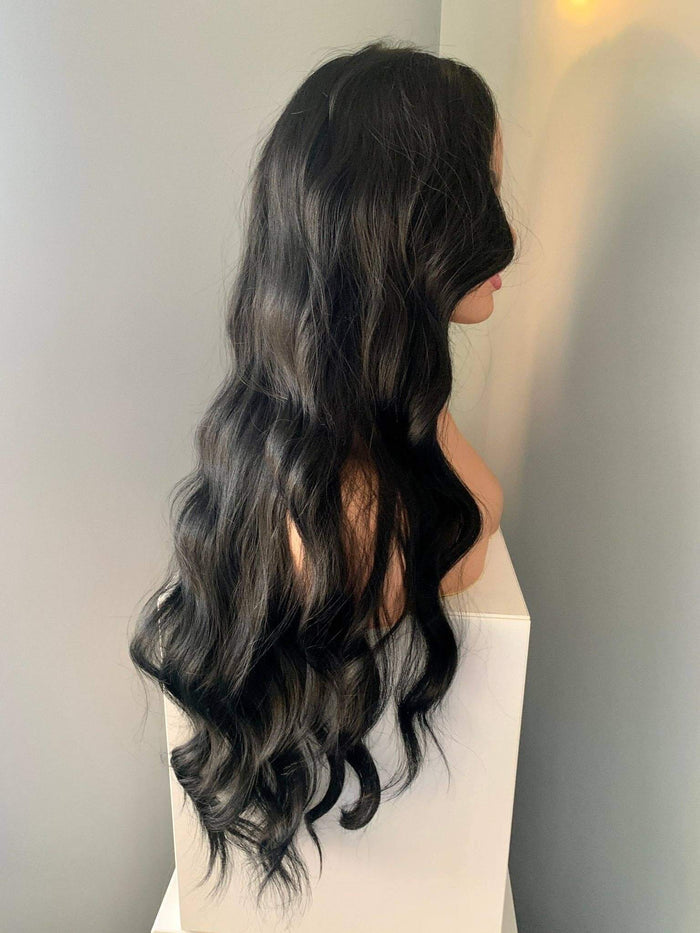 Side view of the Valentina Long Black Soft Waves Wig showing elegant soft waves and a natural look.