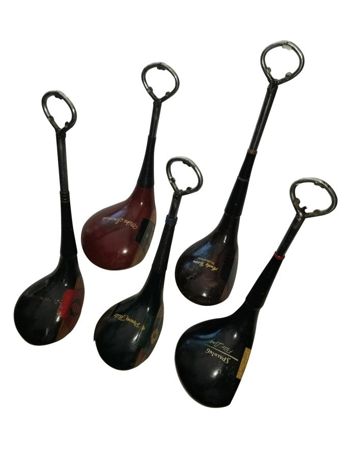 VINTAGE GOLF GIFTS' VINTAGE WOOD DRIVER BOTTLE OPENER features handles made from recycled wood golf clubs, designed to resemble classic club heads—unique vintage golf gifts, ideal for any enthusiast.