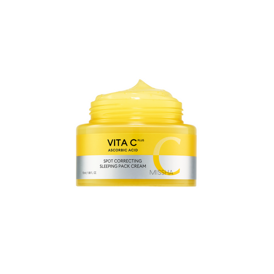 Yellow jar of Missha Vitamin C cream on a white background