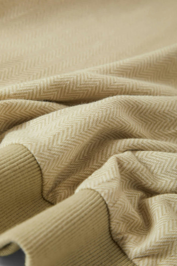 Men's Weekend Herringbone S/S Polo in the color Whitecap/Elm - Additional Laydown image
