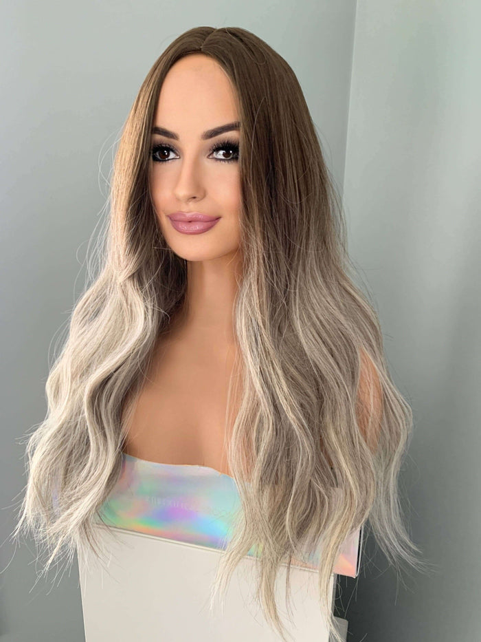 Willow Long Wavy Grey Silver Wig by The Extension Room with loose beachy waves and a natural centre part.