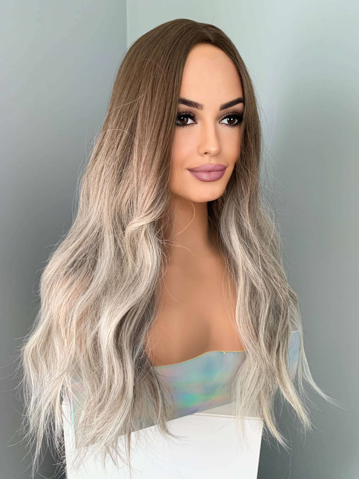 Willow Long Wavy Grey Silver Wig featuring beachy waves and a natural center part.