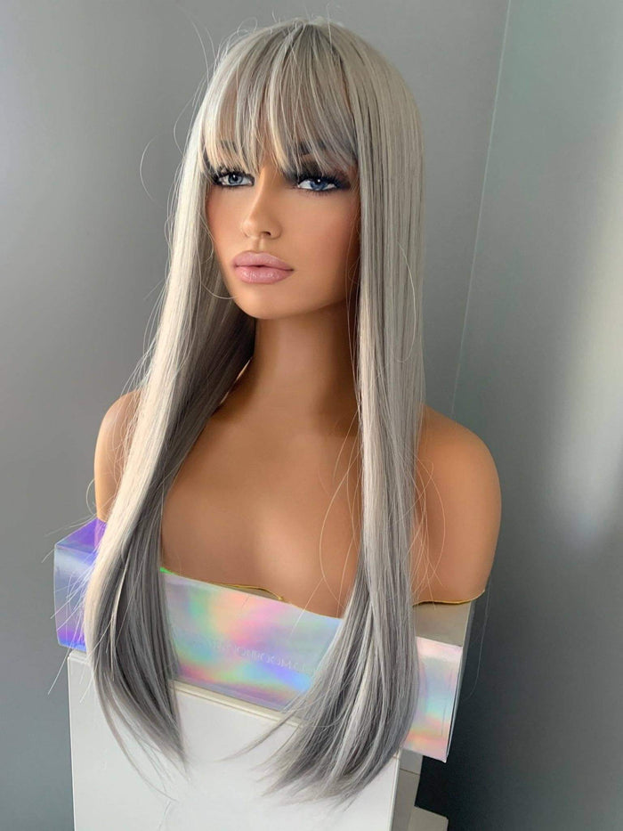 Winny Long Straight Grey Silver Wig with Bangs displayed on a mannequin, showcasing sleek silky strands and polished style.