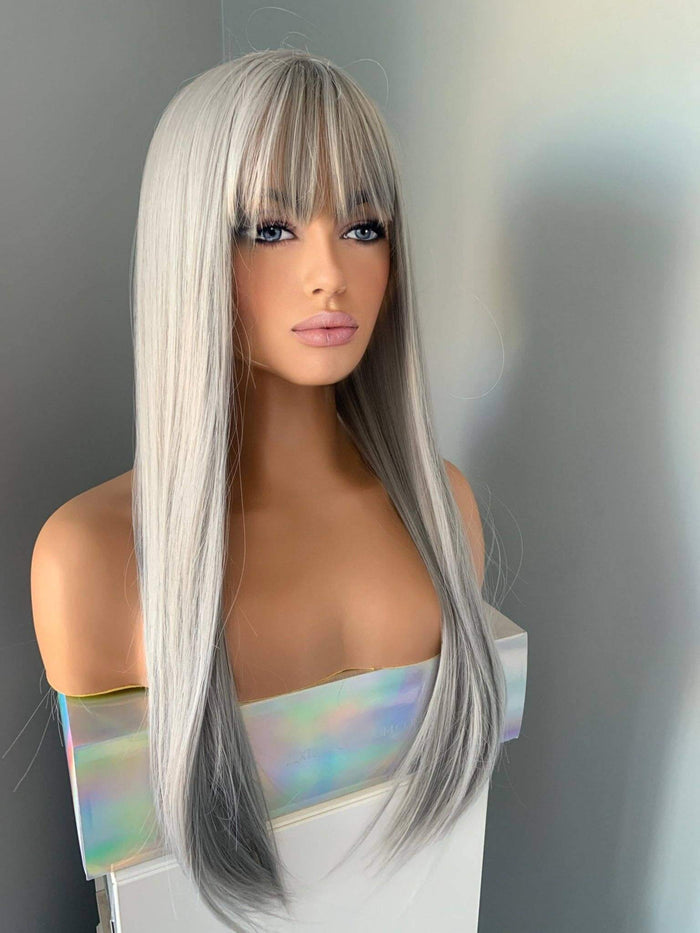 Winny Long Straight Grey Silver Wig with Bangs displayed on a mannequin, showcasing a sleek silver wig look.